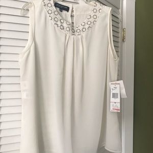 Shear lined blouse with beaded neck.  Never worn